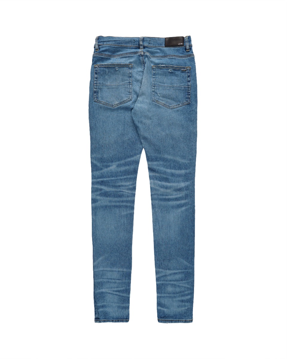 Amiri knee-ripped blue skinny jeans thumbnail