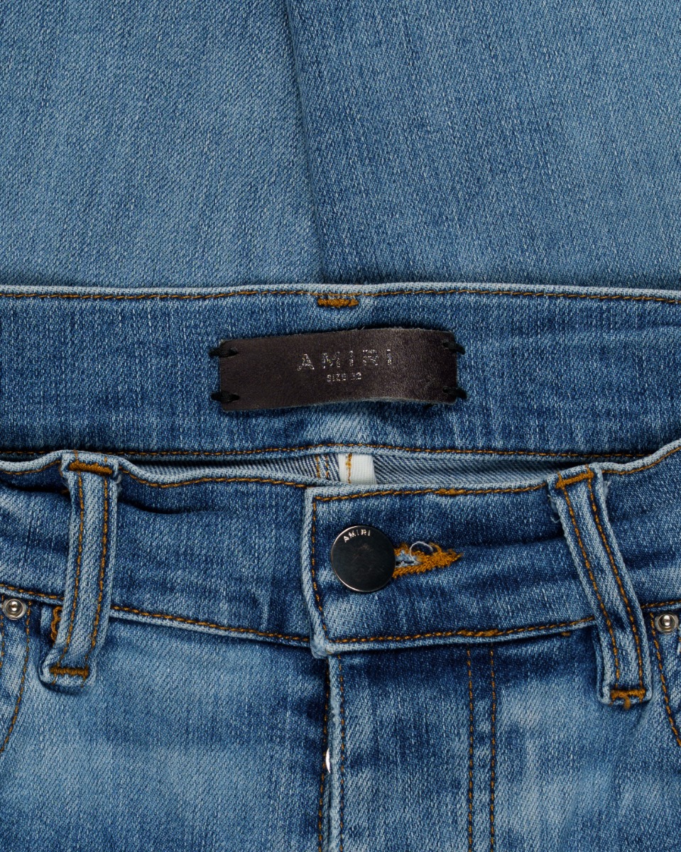 Amiri knee-ripped blue skinny jeans thumbnail