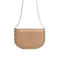 Valentino Garavani Rockstud powder beige crossbody mini saddle bag