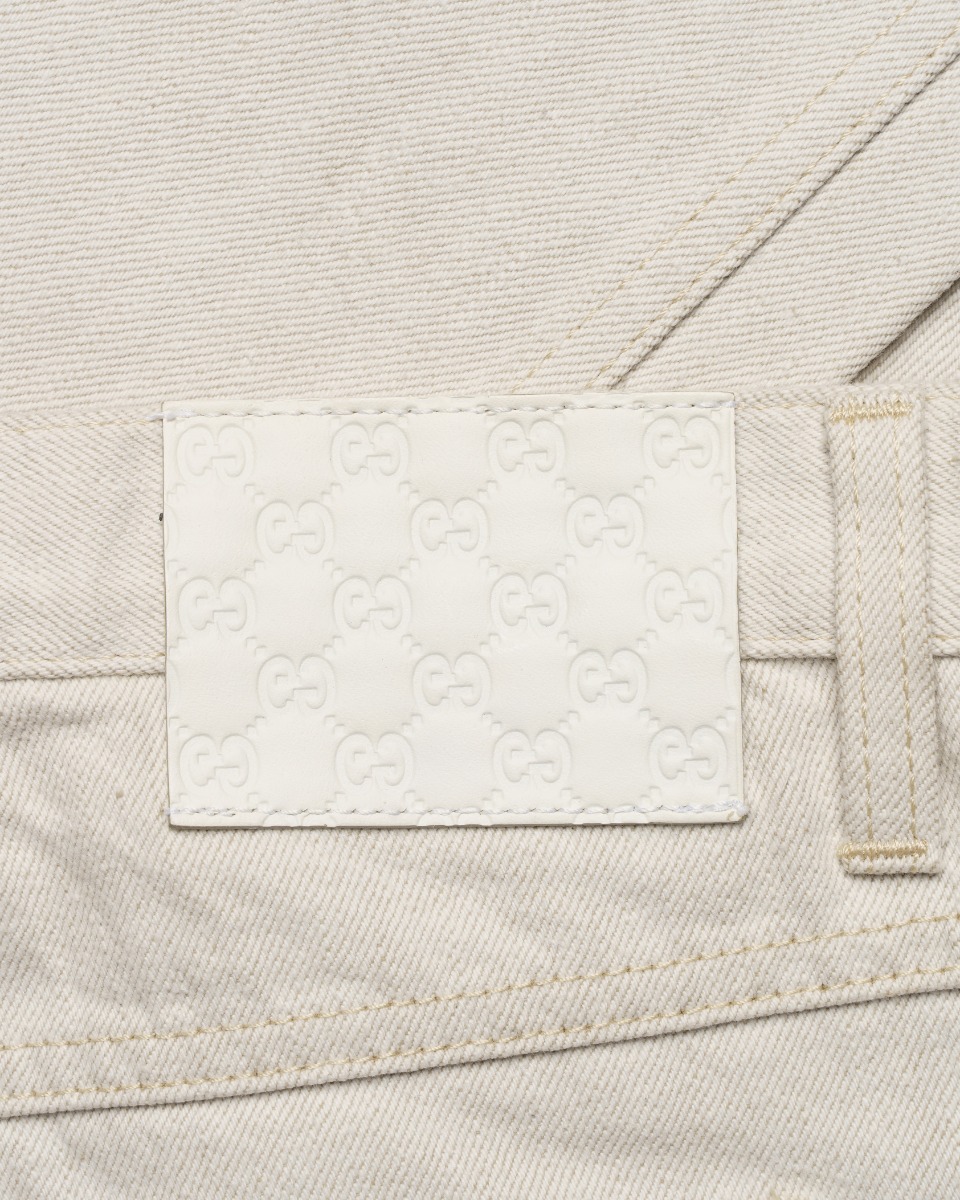 Gucci garment-dyed off-white denim pants thumbnail