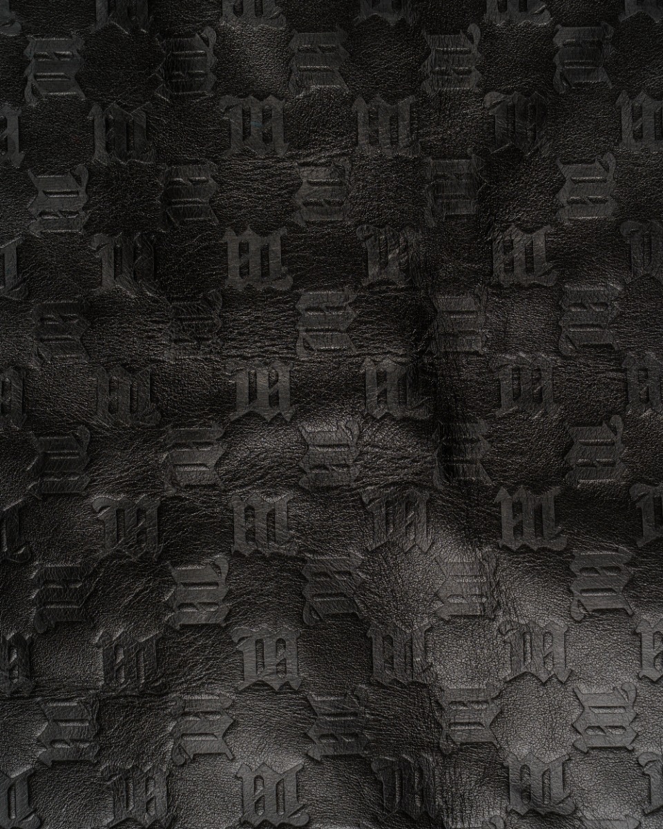 MISBHV monogram-embossed leather vest thumbnail